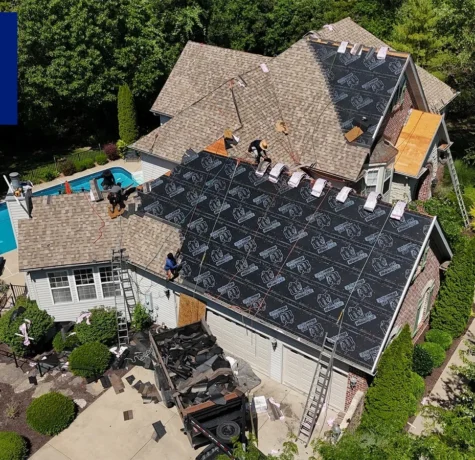 roof damaged by summer storms St. Louis