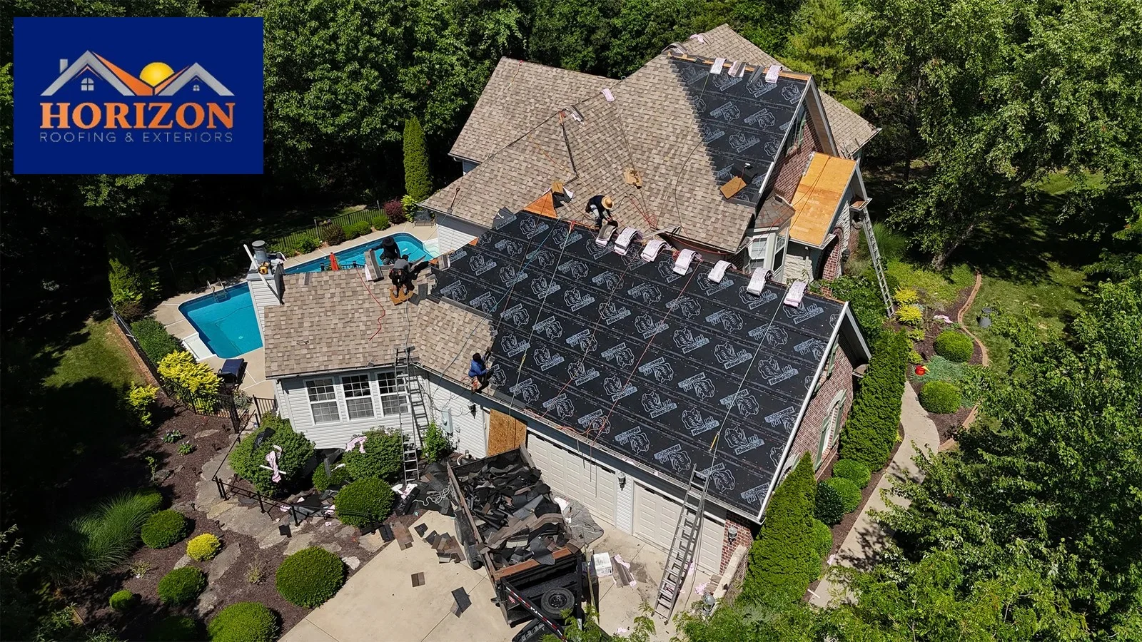 roof damaged by summer storms St. Louis
